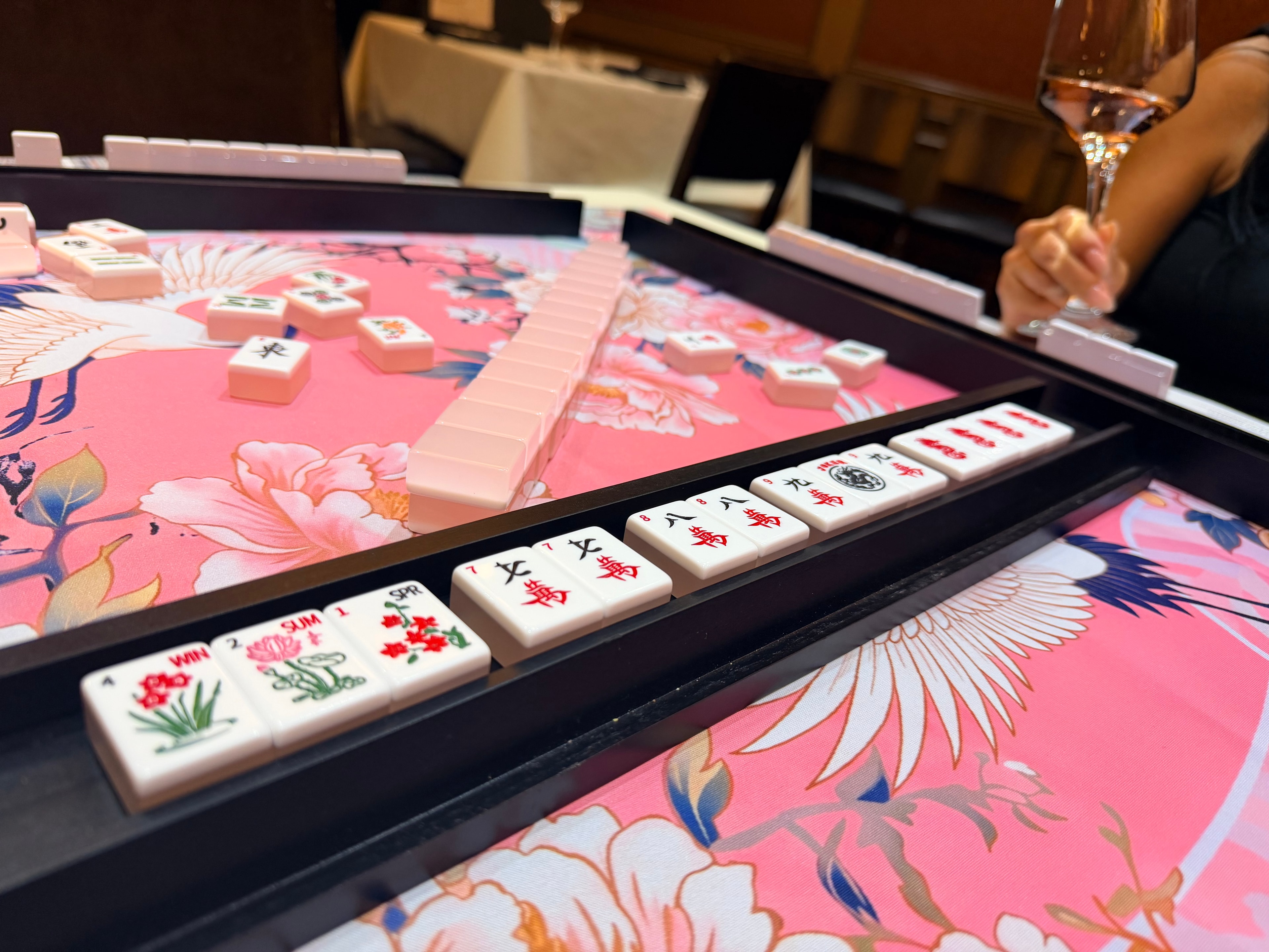 Women socializing at a Mahjong party